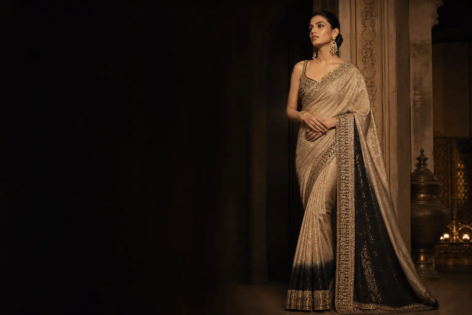 Elegant woman in a champagne-gold designer saree